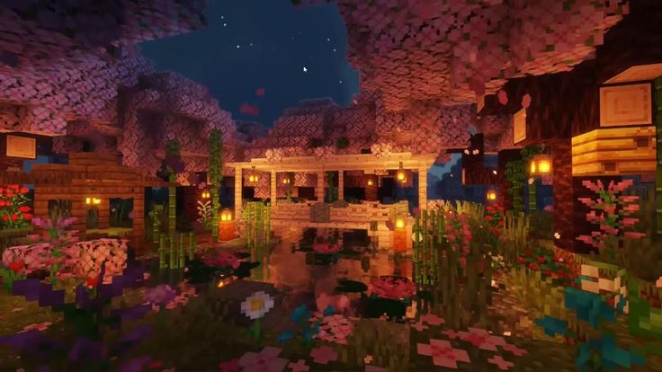 Lanterns lighting a flower-filled village beside a pond at night